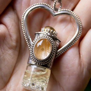 Fountain Sunset Rollerball Necklace Series - Amber & Yellow Rutilated Quartz on Black Leaf Pattern